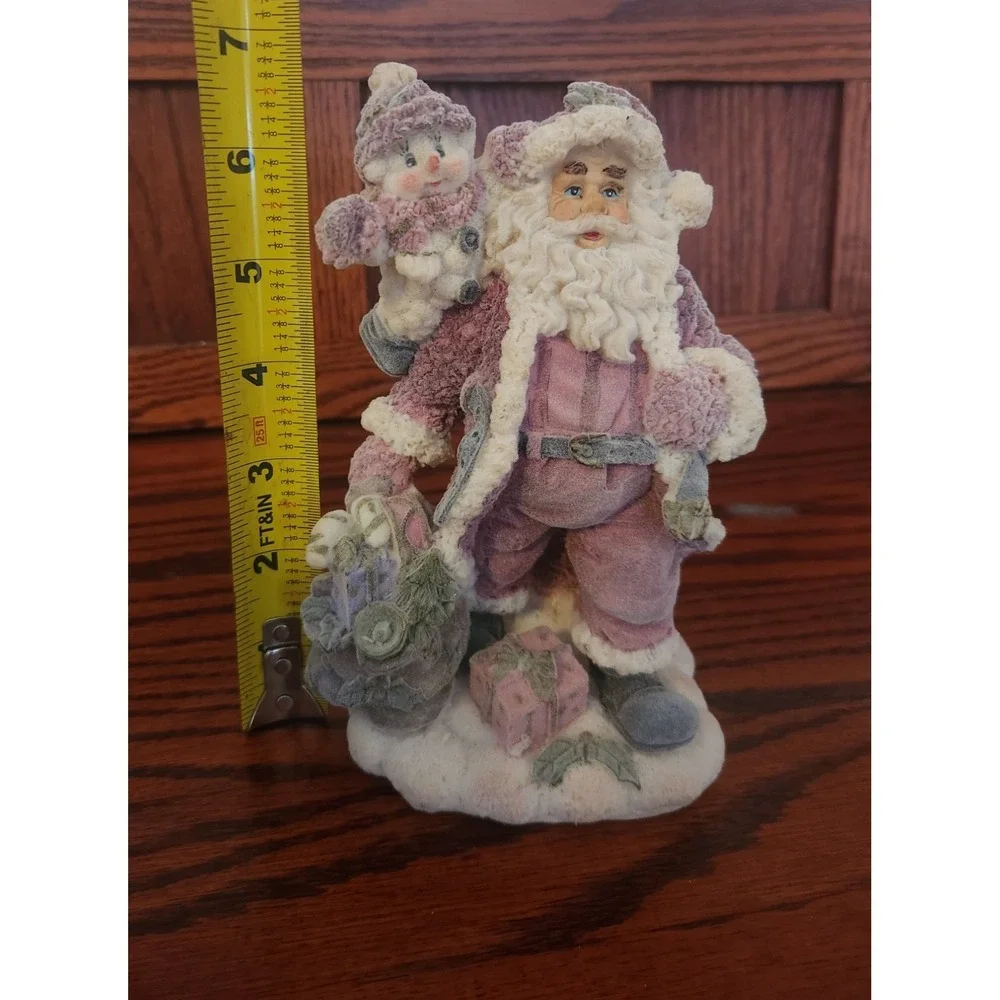 Vintage Velvet Touch Santa Claus with small‎ snow child holding a lantern.